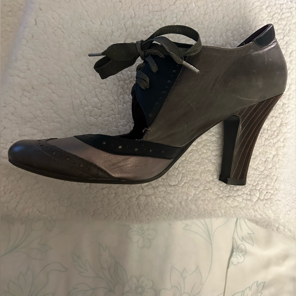 Jeffrey Campbell lace up wing-tip heels.